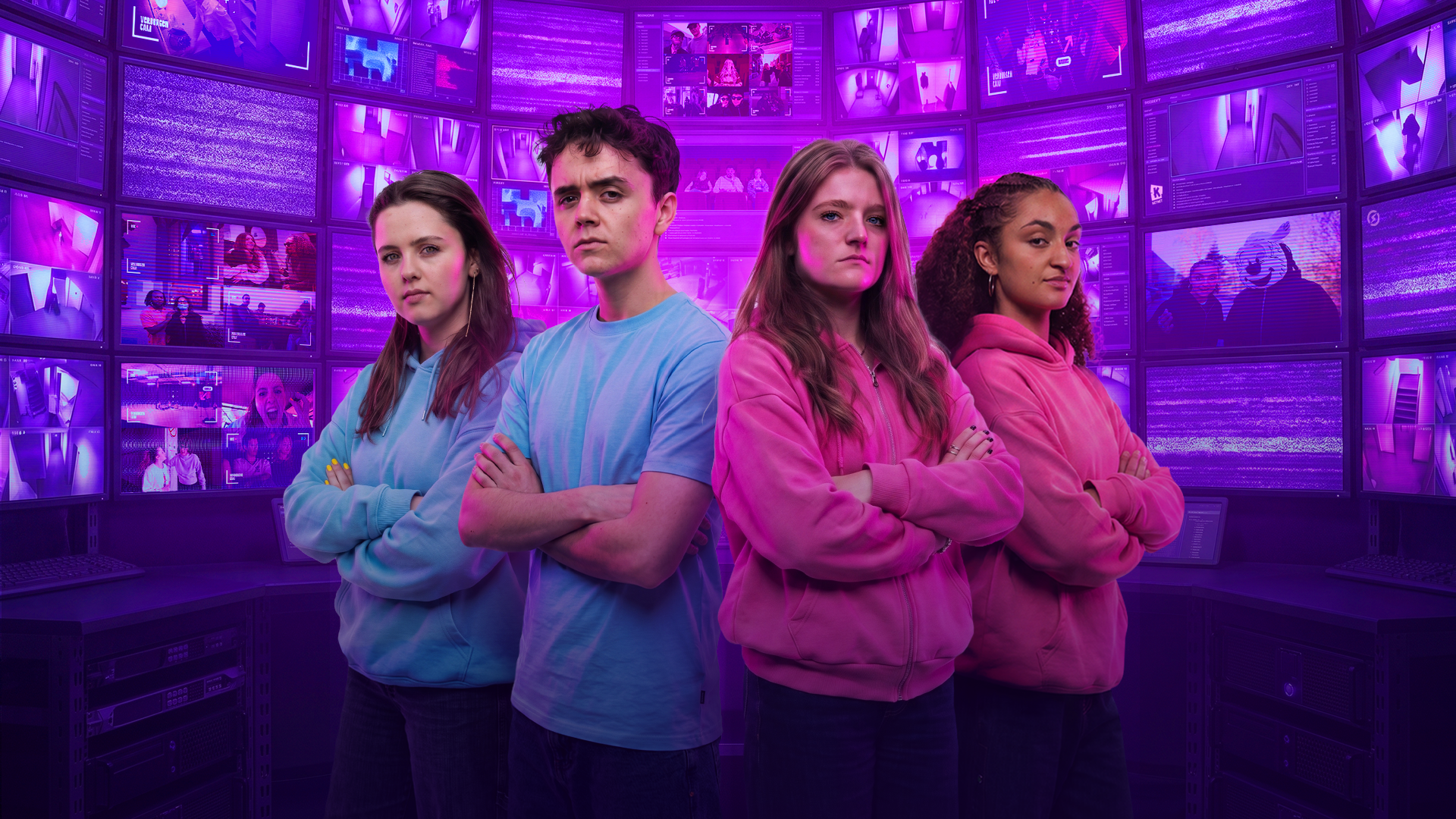 The four hosts of Unseen standing in front of a wall of surveillance screens